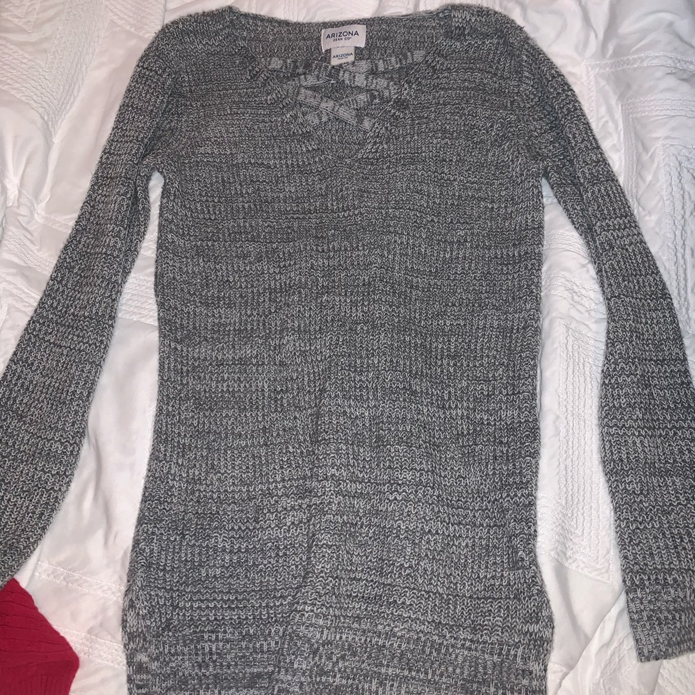 A cross front sweater